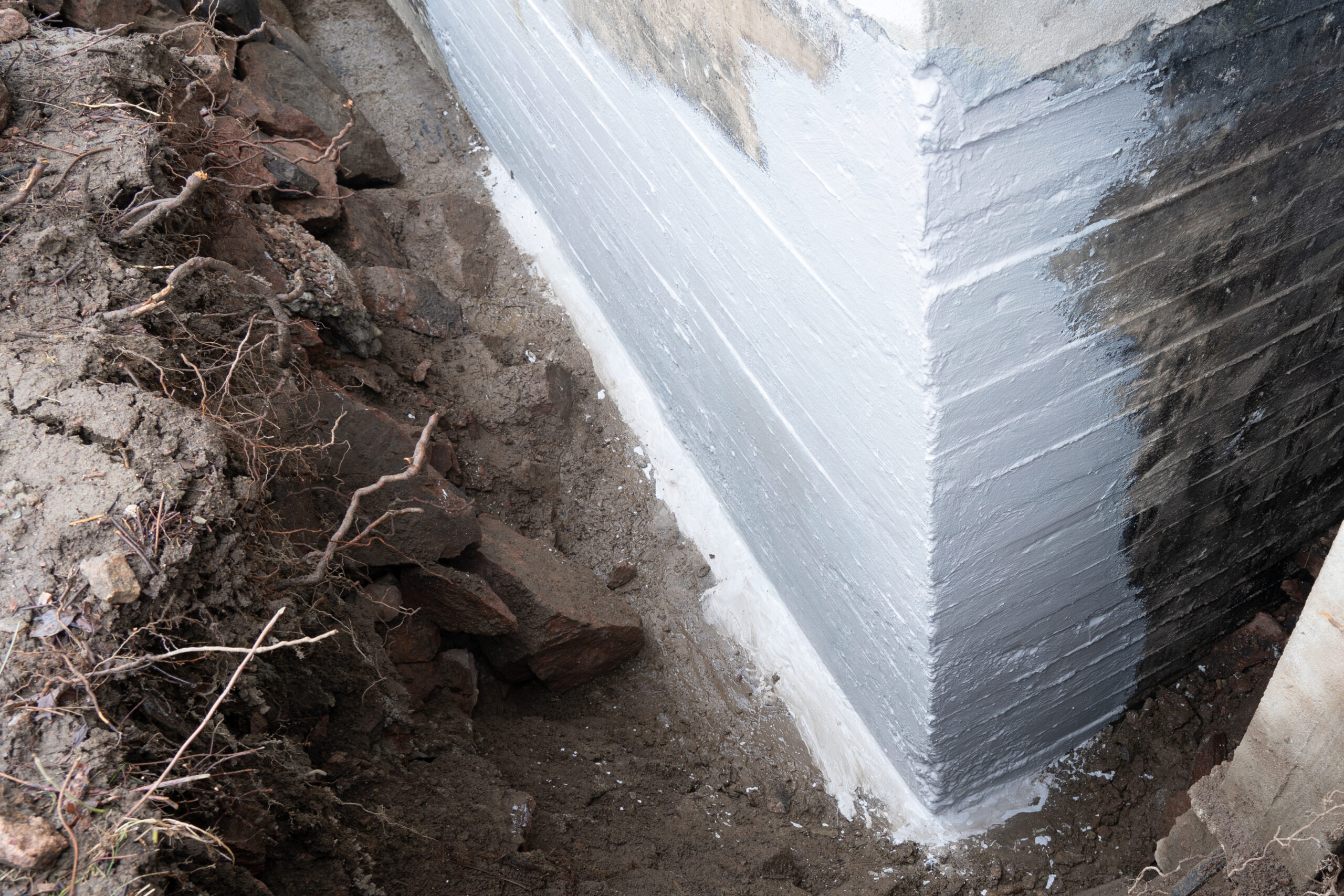 Waterproofing house corner basement and foundations.